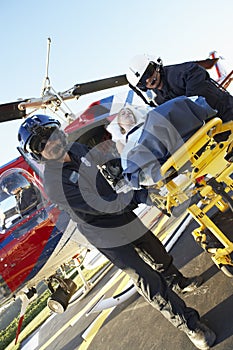 Paramedics Unloading Patient From Helicopter