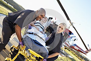 Paramedics Unloading Patient From Helicopter