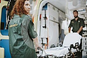 Paramedics at work with an ambulance photo