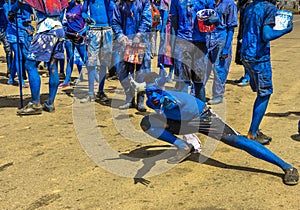 A Paramin Blue Devil strikes a pose as he celebrates Carnival in Trinidad