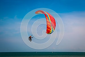 Paramotor on the beach rayong at blue sky