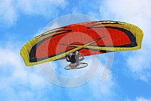 Paramotor in a blue sky