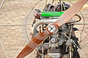 Paramotor engine and large brown propellers