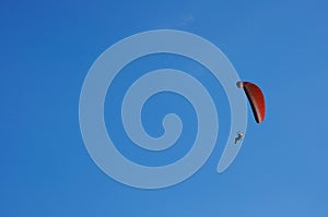 Paramotor Extreme sport flying on blue sky