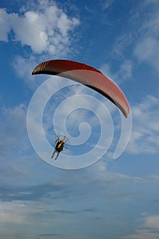 Paramotor Extreme Sports flying on blue sky
