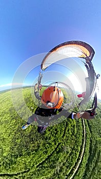 Paramotor flying glide into sky