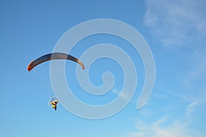 Paramotor flying on the sky