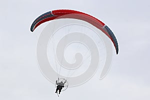 Paramotor pilot flying wing