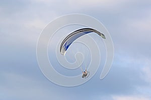 Paramotor pilot flying wing