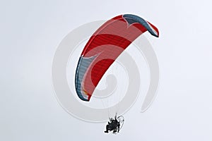 Paramotor pilot flying wing