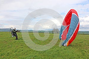 Paramotor pilot launching wing