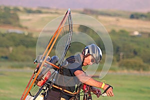 Paramotor pilot preparing to fly