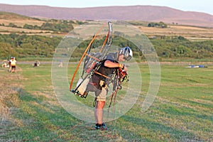 Paramotor pilot preparing to fly
