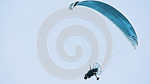 Paramotor Tandem Gliding And Flying In The Air. Copy space