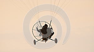 Paramotor Tandem Gliding And Flying In The Air. Copy space