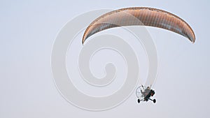 Paramotor Tandem Gliding And Flying In The Air. Copy space