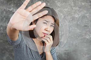 paranoid delusion with Asian woman feeling fear and panic attack photo