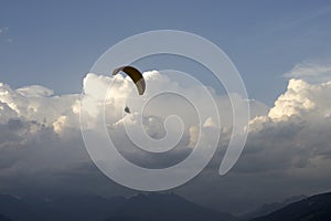 Parapente in the clouds photo