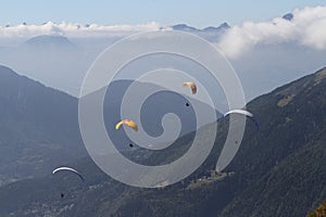 Parapenter`s viewed from Plan de l`Aiguille at 2,310 meters - Chamonix Mont Blanc. photo