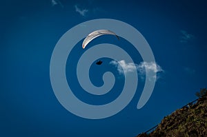 A paraplan in a blue sky