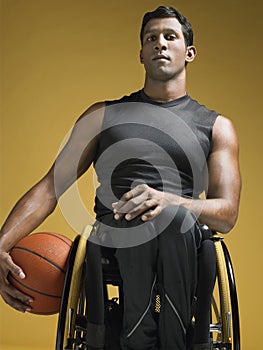 Paraplegic Athlete With Basketball In Wheelchair