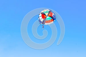 Parasailing behind sunset at Windmill viewpoints, Delight of people from parasailing flight - incredible impressions of the