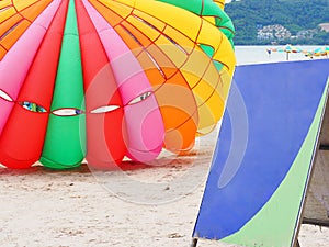 Parasailing colorful and blank color signboard at Patong Beach Phuket, Thailand