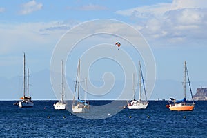 Parasailing on Gran Canaria, in the background you see the outline of the volcano Teide on the neighbouring island Tenerife