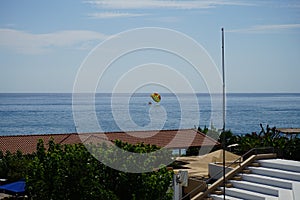 Parasailing in the Mediterranean. Parasailing is a recreational kiting. Kolympia, Rhodes, Greece