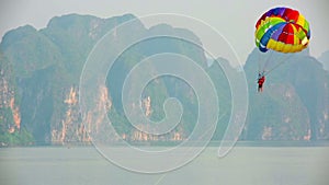 parasailing over limestone mountain islands,Halong Bay,Vietnam