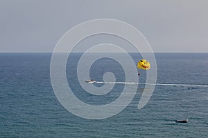 Parasailing is a popular pastime in many resorts around the world. The active form of relaxation