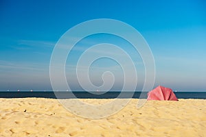 Parasol at the empty beach