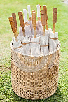 Parasols in the basket on the lawn