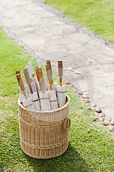 Parasols in the basket on the lawn