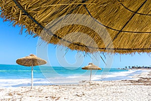 Parasols on the Beach of Djerba in Tunisia