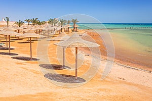 Parasols on the beach of Red Sea in Hurghada