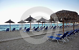 Parasols and deckchairs on the beach