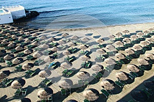 Parasols lined up on the beach of Varazze.