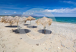 Parasols at the Maleme beach on Crete, Greece