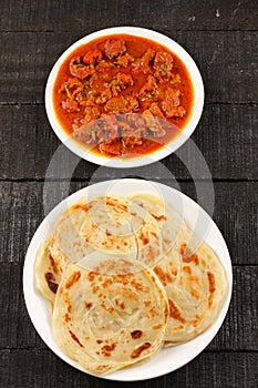 Paratha with meat curry