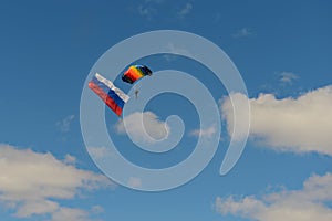 A paratrooper with the flag of Russia