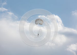 Paratrooper in the sky with a parachute