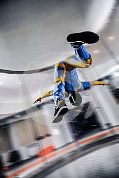 Paratrooper. Speedfly start. Fly men is a pilot of his body in air. Parachutist in blue suit. Air sport as a way of life