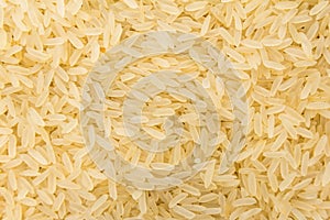Parboiled Chinese Rice seed. Closeup of grains, background use. photo