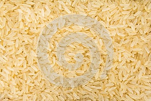 Parboiled Chinese Rice seed. Closeup of grains, background use. photo