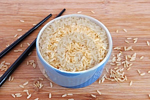 Parboiled rice in blue bowl