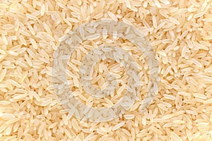 Parboiled rice texture background.