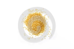 Parboiled rice on white background