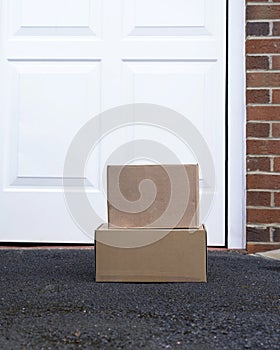 Parcel cardboard box in front door.Door to Door delivery of good merchandises while the quarantine,Delivered outside the door, e-