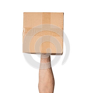 Parcel in male hands. Top view. Isolate